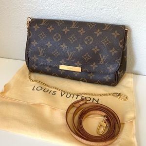 Sold. Louis Vuitton Favorite MM clutch crossbody